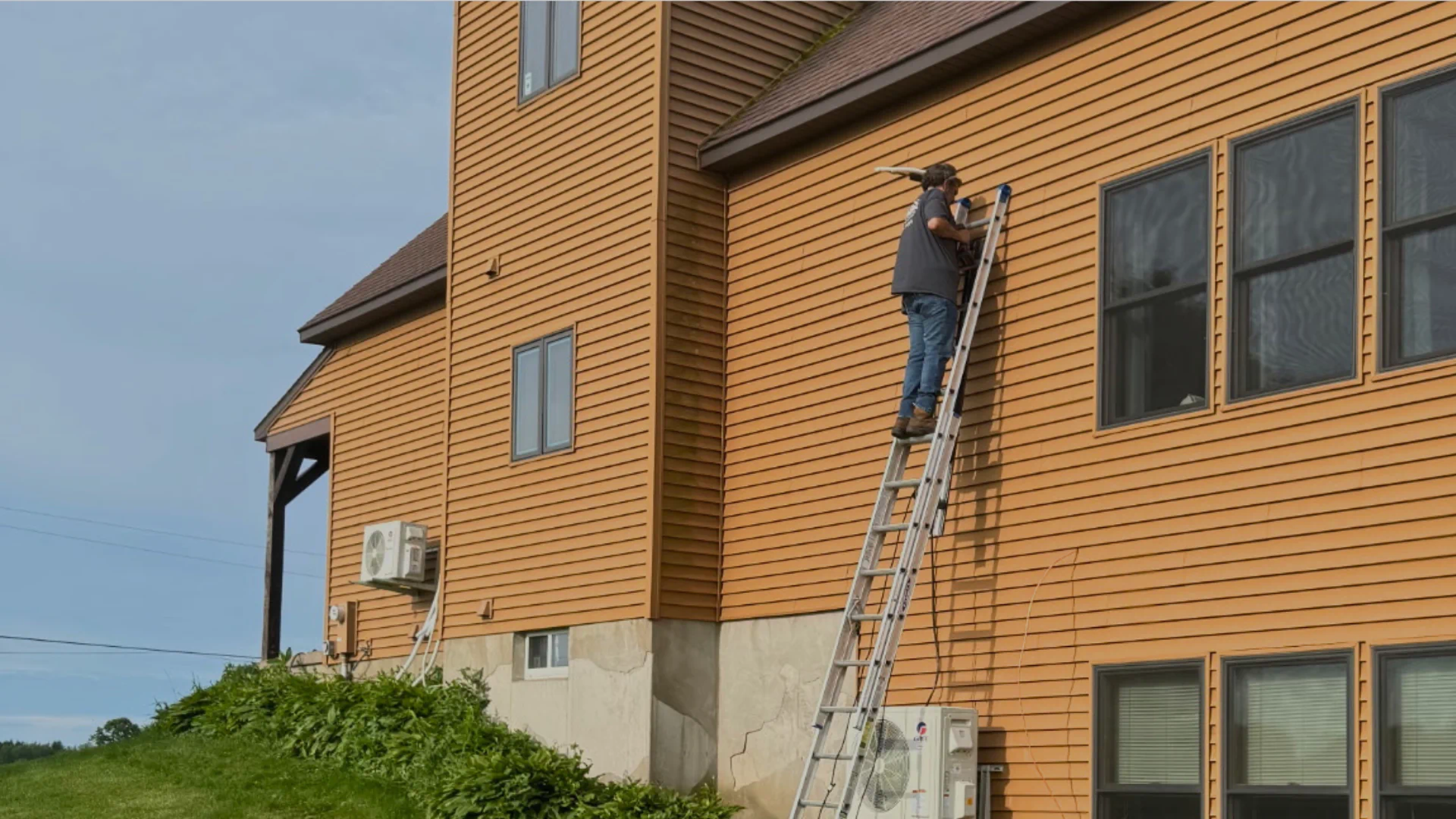 Ross Heating and Air Conditioning technician working on a home HVAC system