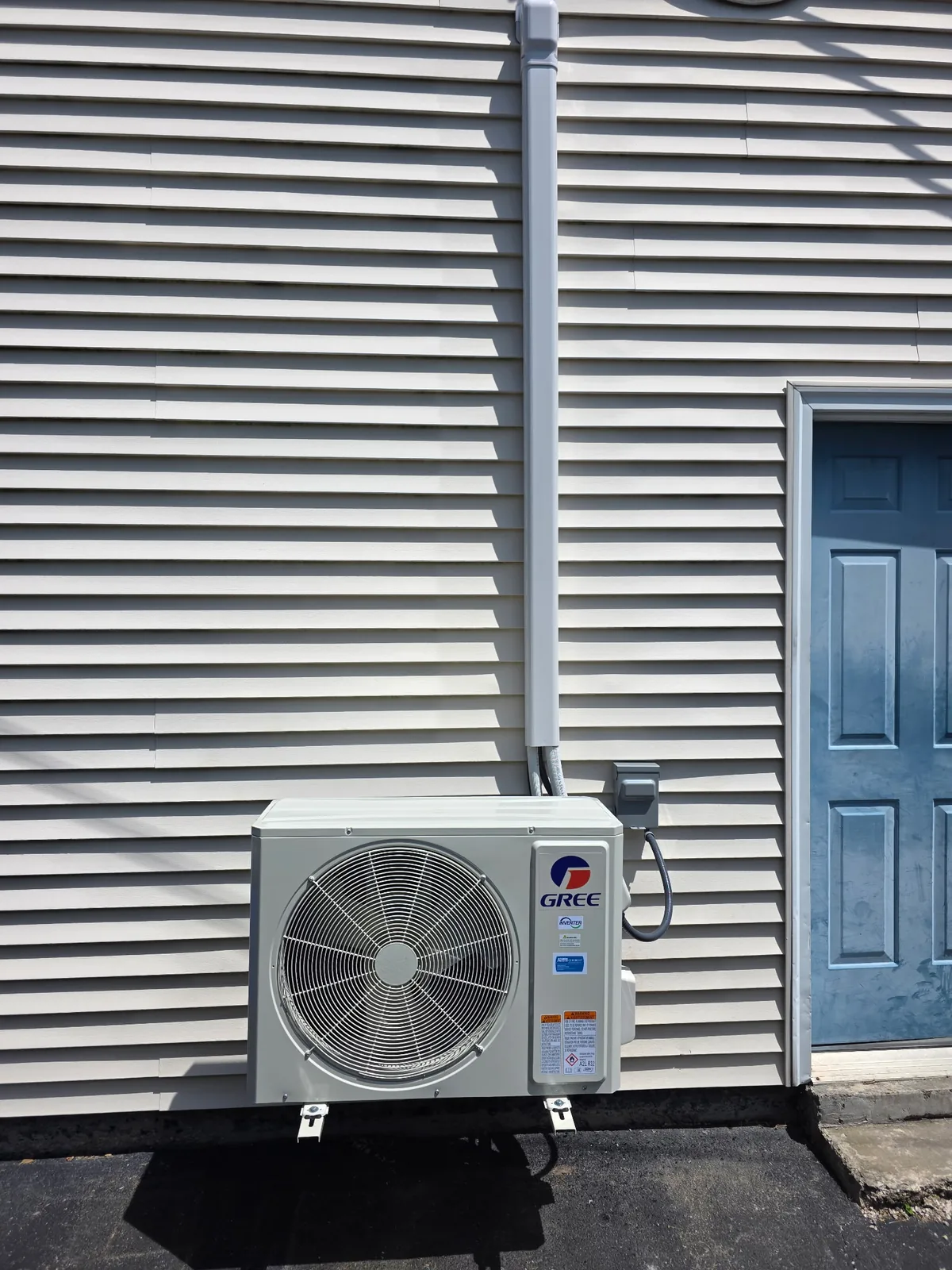Clean outdoor Gree HVAC equipment installation photo