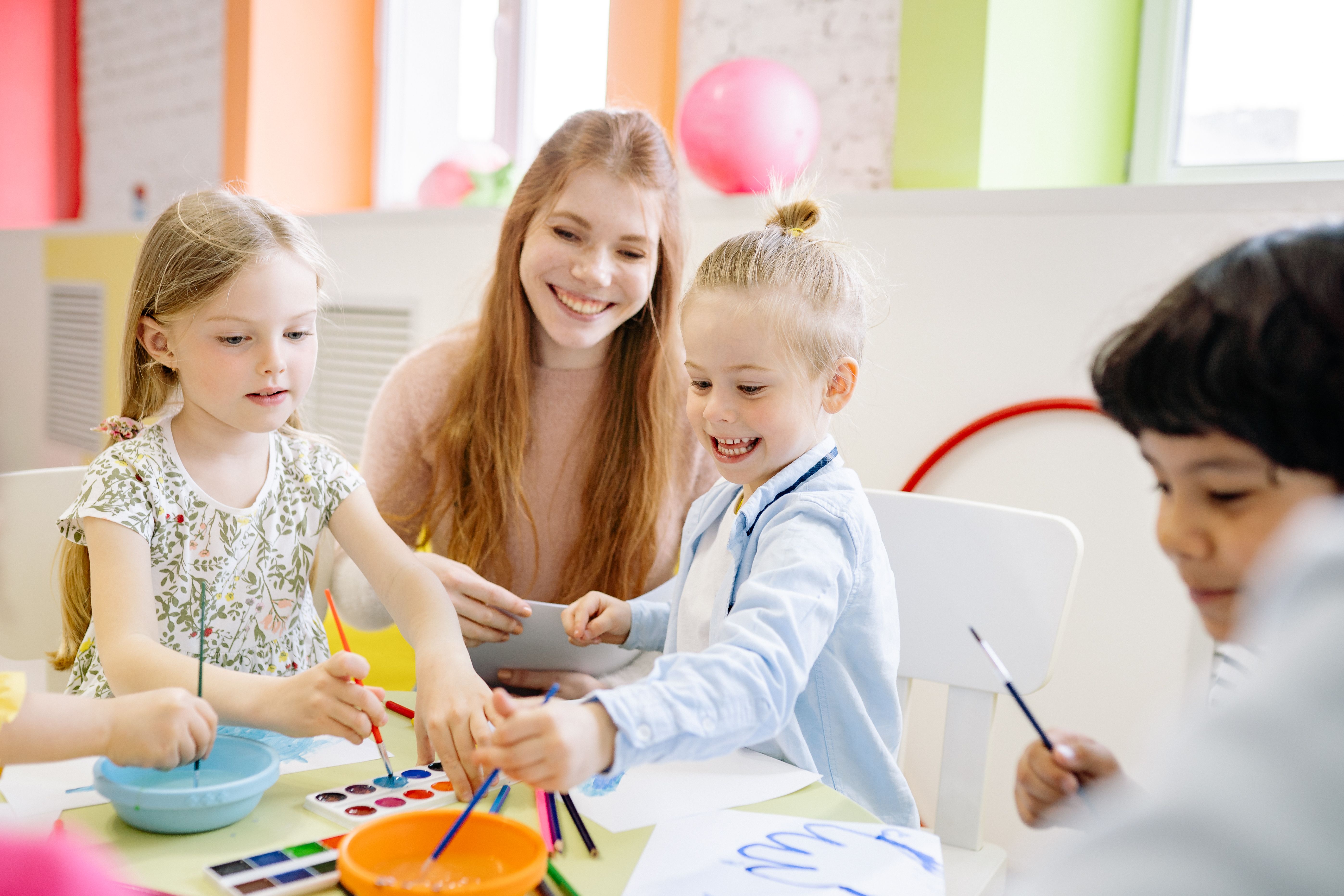 Teacher connecting with children