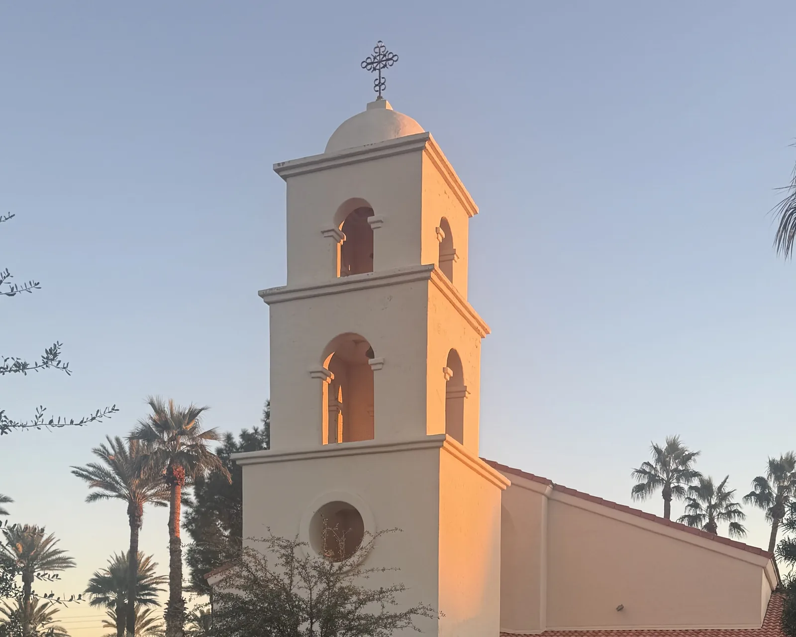 The bell tower of St. Peter's Episcopal Church at sunset