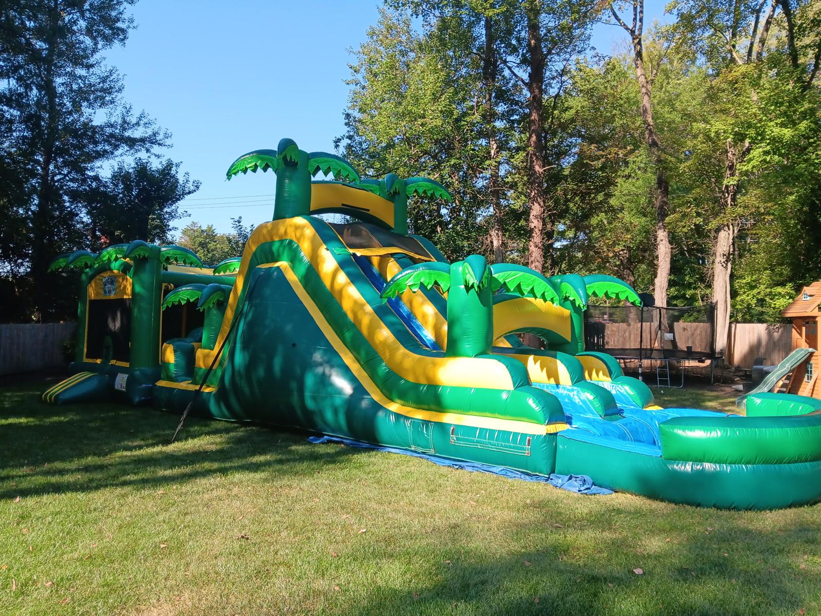 16 foot Tropical Dual Slide with Pool inflatable water slide rental from Smiley Jump, available in Germantown, Maryland, Washington DC, and Northern Virginia for birthday parties, school events, church gatherings, and summer celebrations