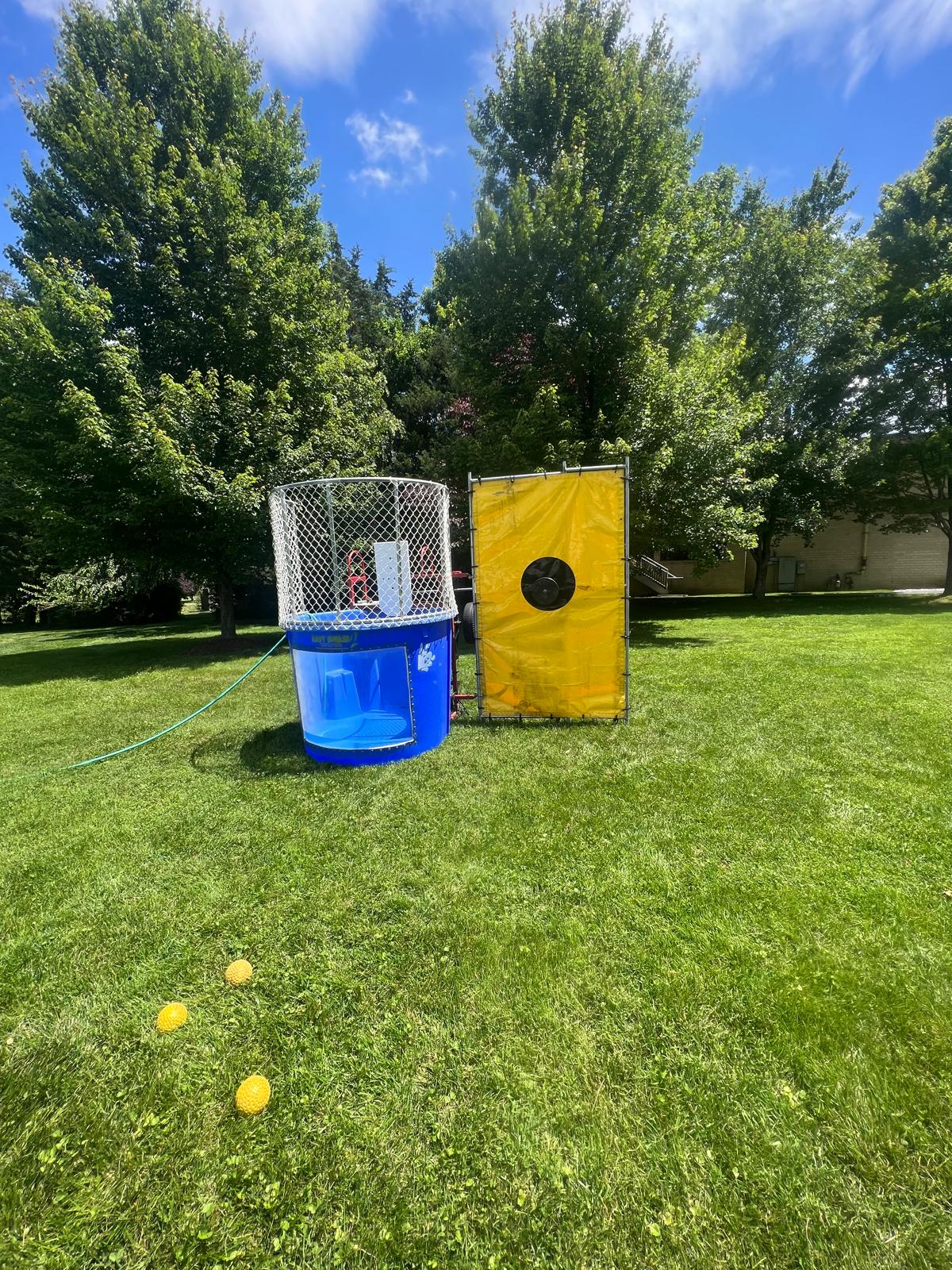 Dunk tank rental from Smiley Jump, available in Germantown, Maryland, Washington DC, and Northern Virginia for school events, church festivals, fundraisers, corporate gatherings, and community celebrations