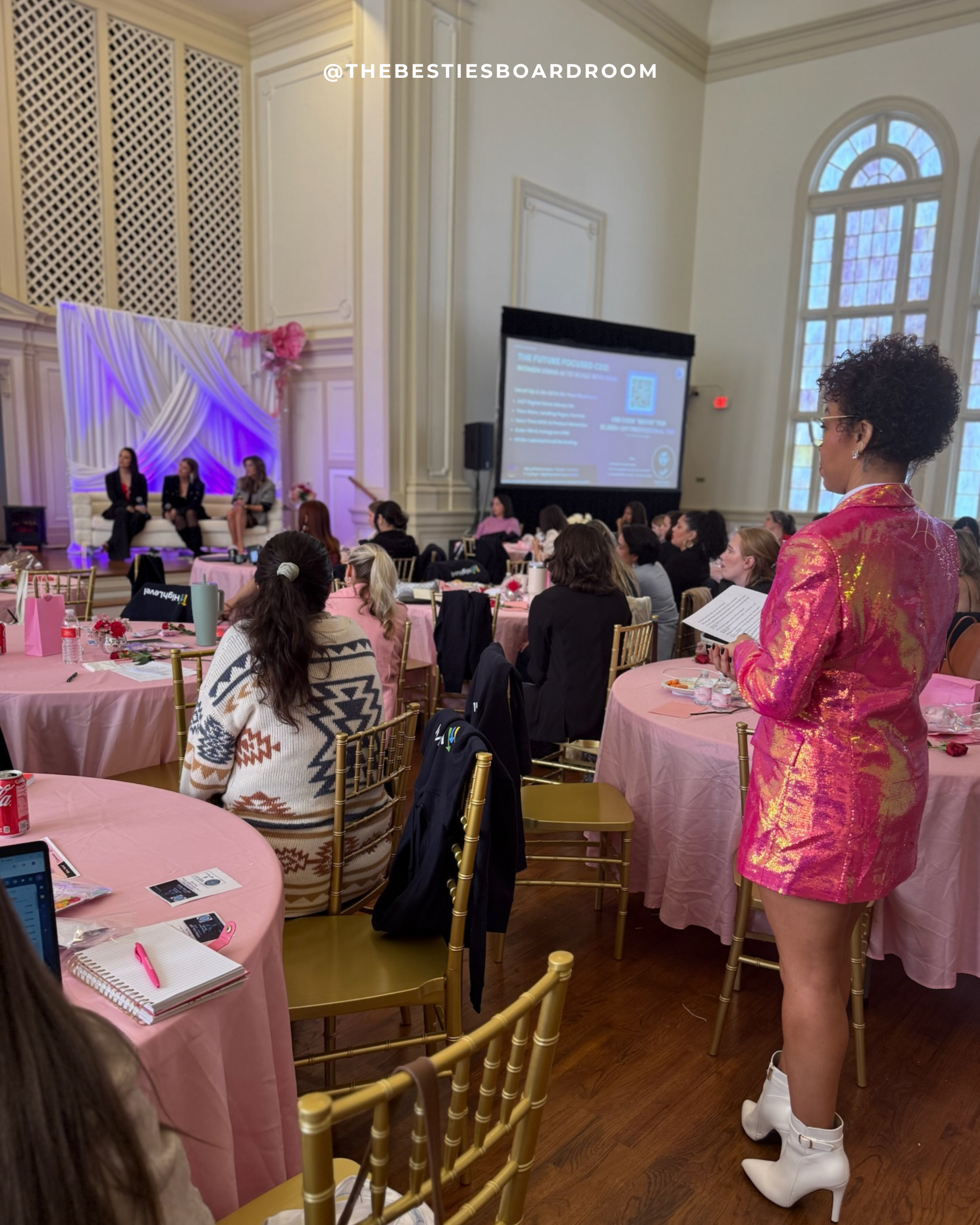 A speaker presenting to The BESTIES Boardroom community