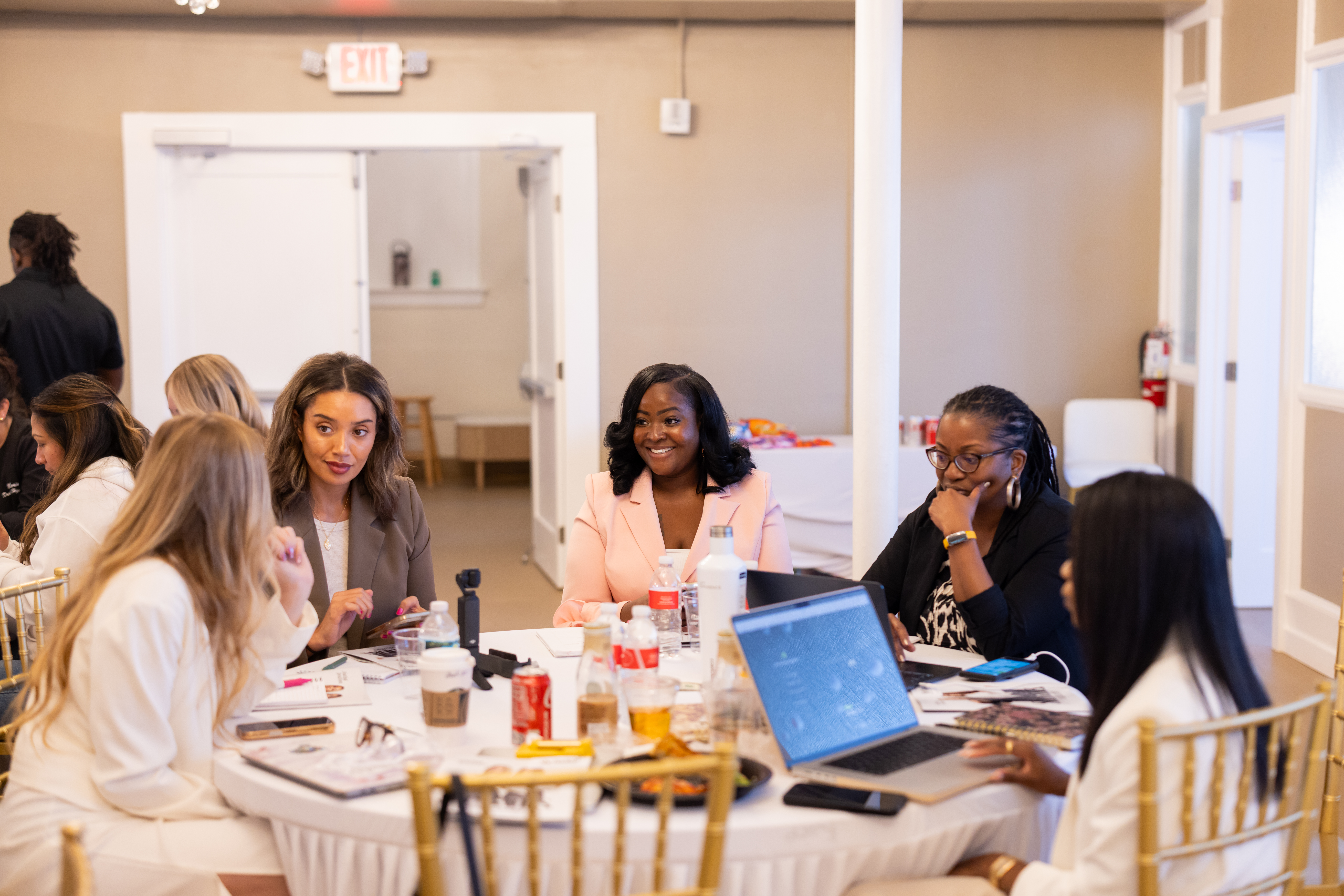 Women inside a BESTIES Boardroom event