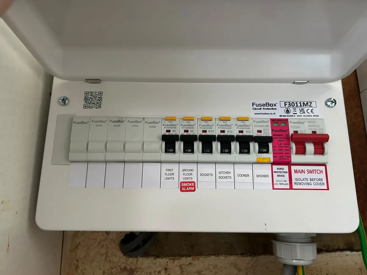 Modern consumer unit with labelled RCBO circuits and surge protection