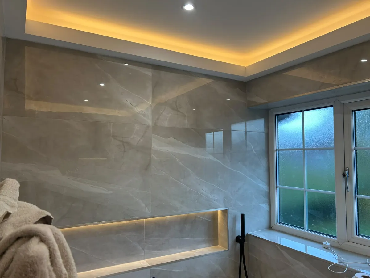 Warm LED cove lighting and downlights fitted by our Talke electricians