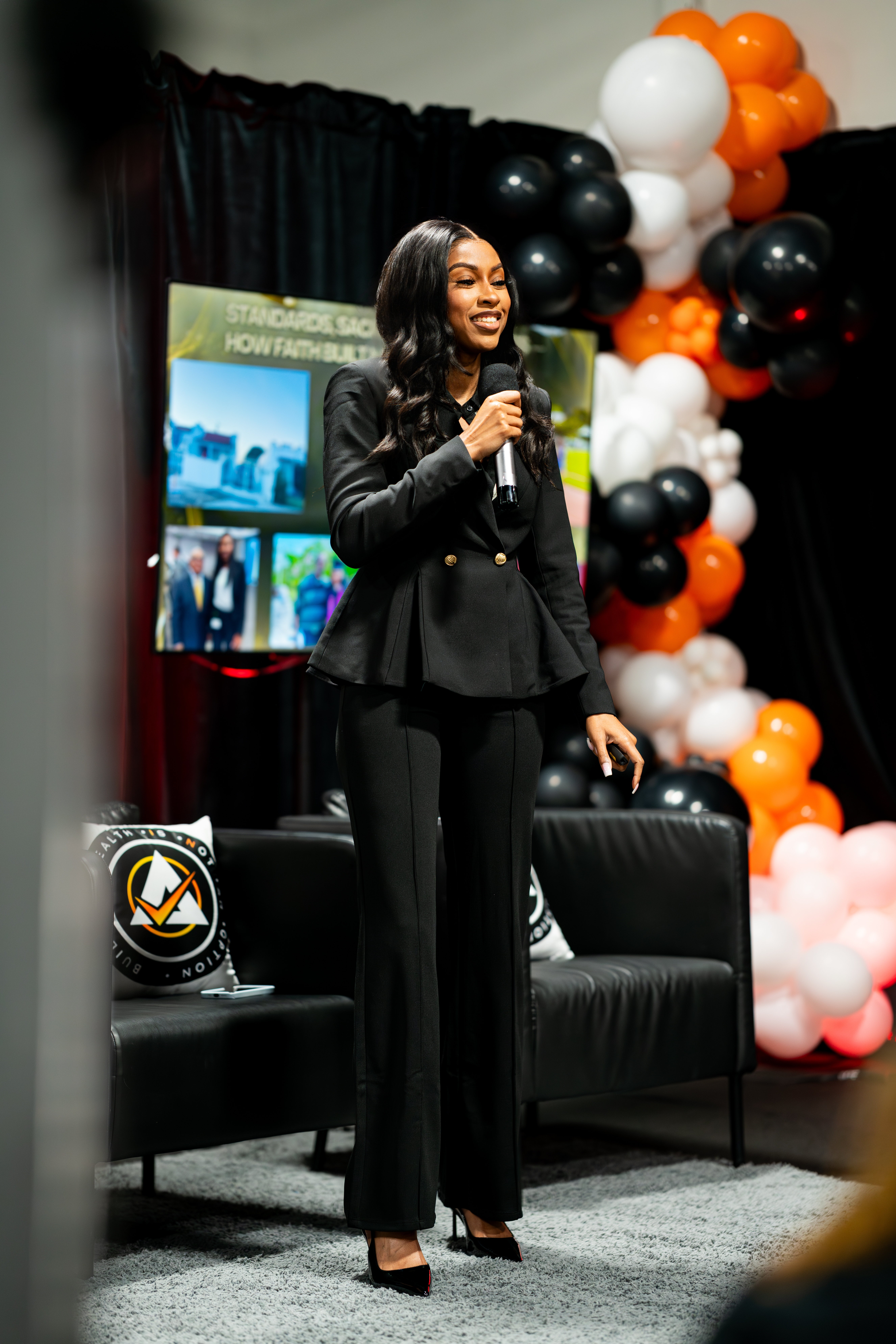 Princess Dior speaking on stage