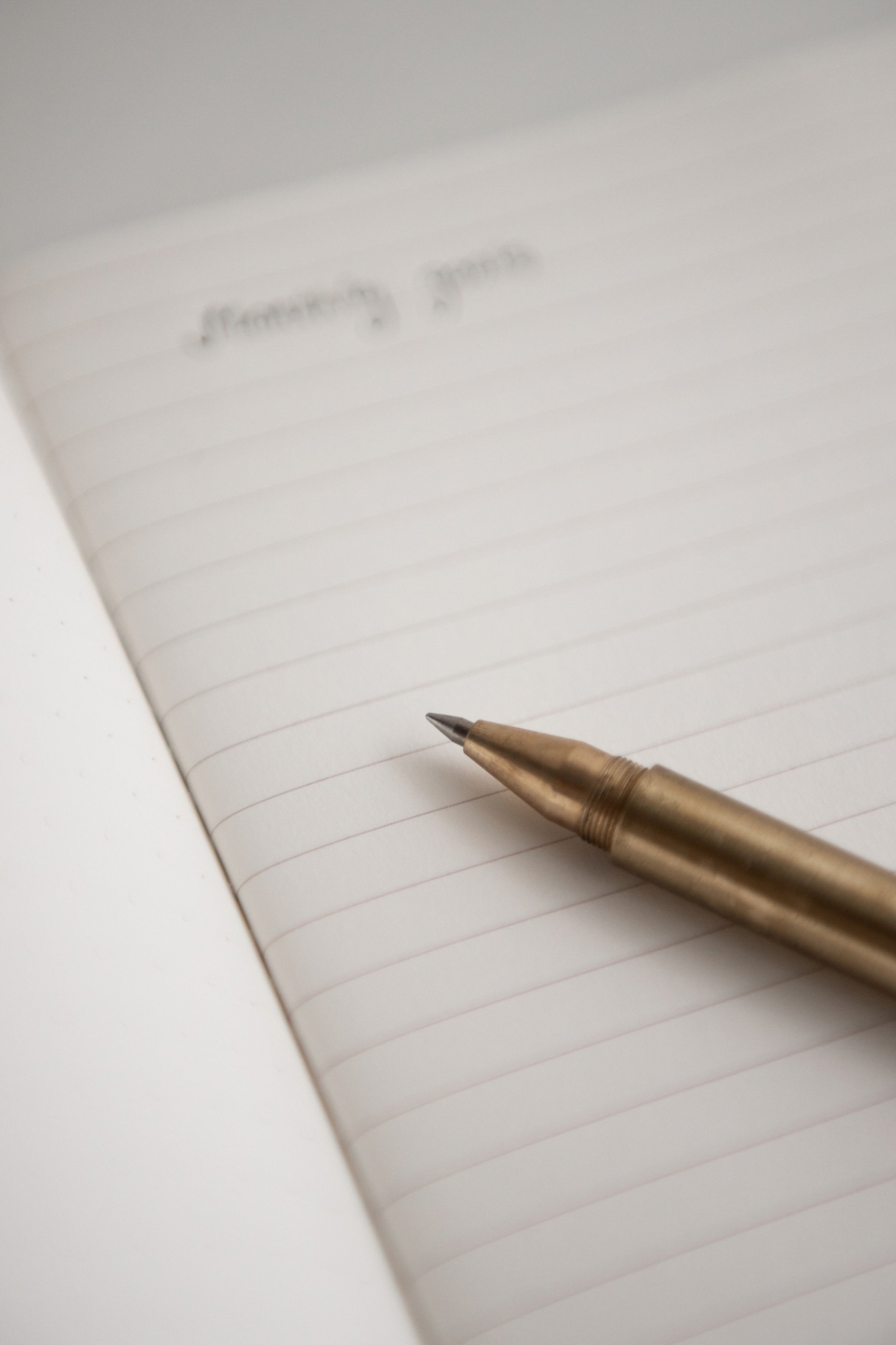 A fountain pen on a journal page. A fountain pen on a journal page.