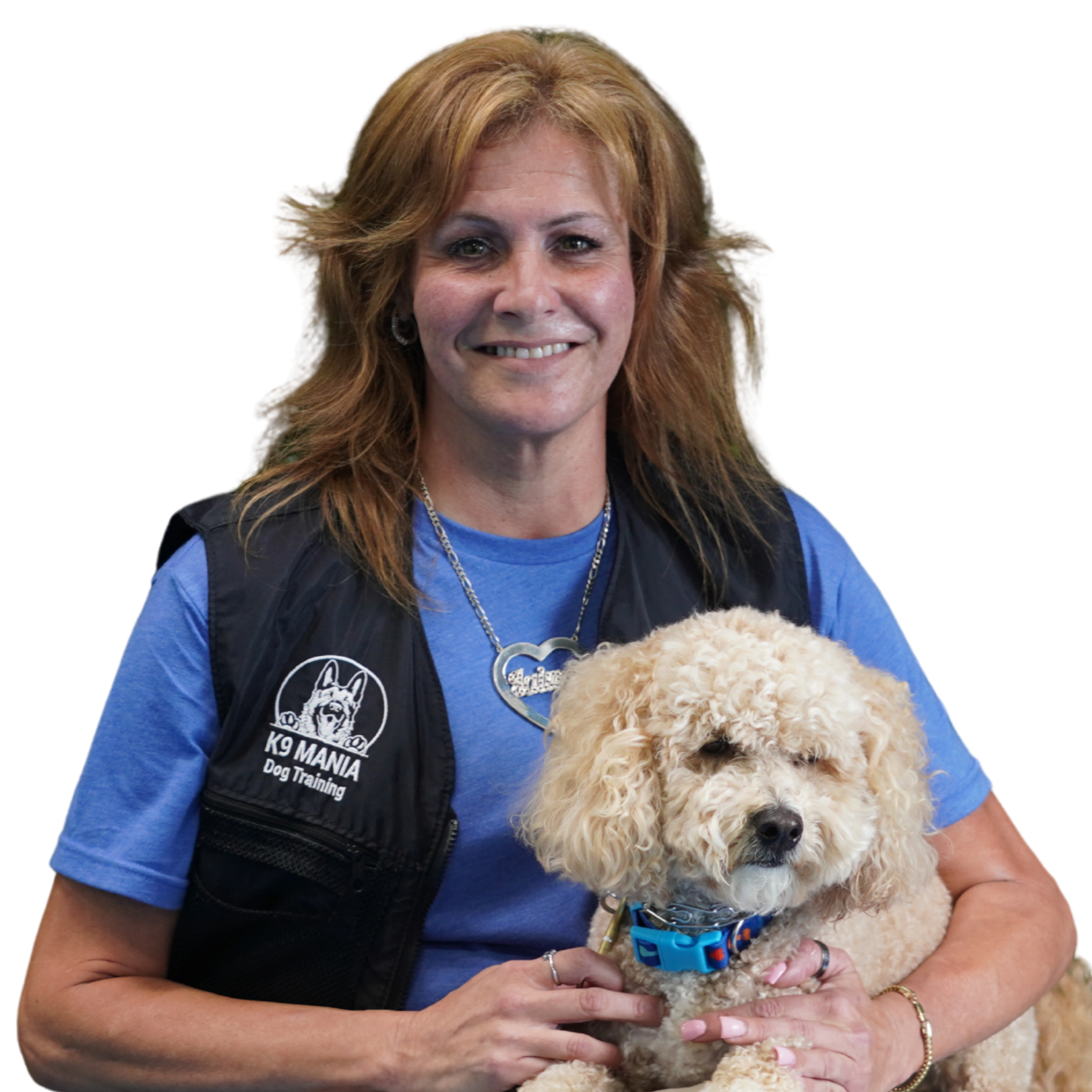 Our Certification 9 K9 Mania Dog Training dog trainer holding a dog