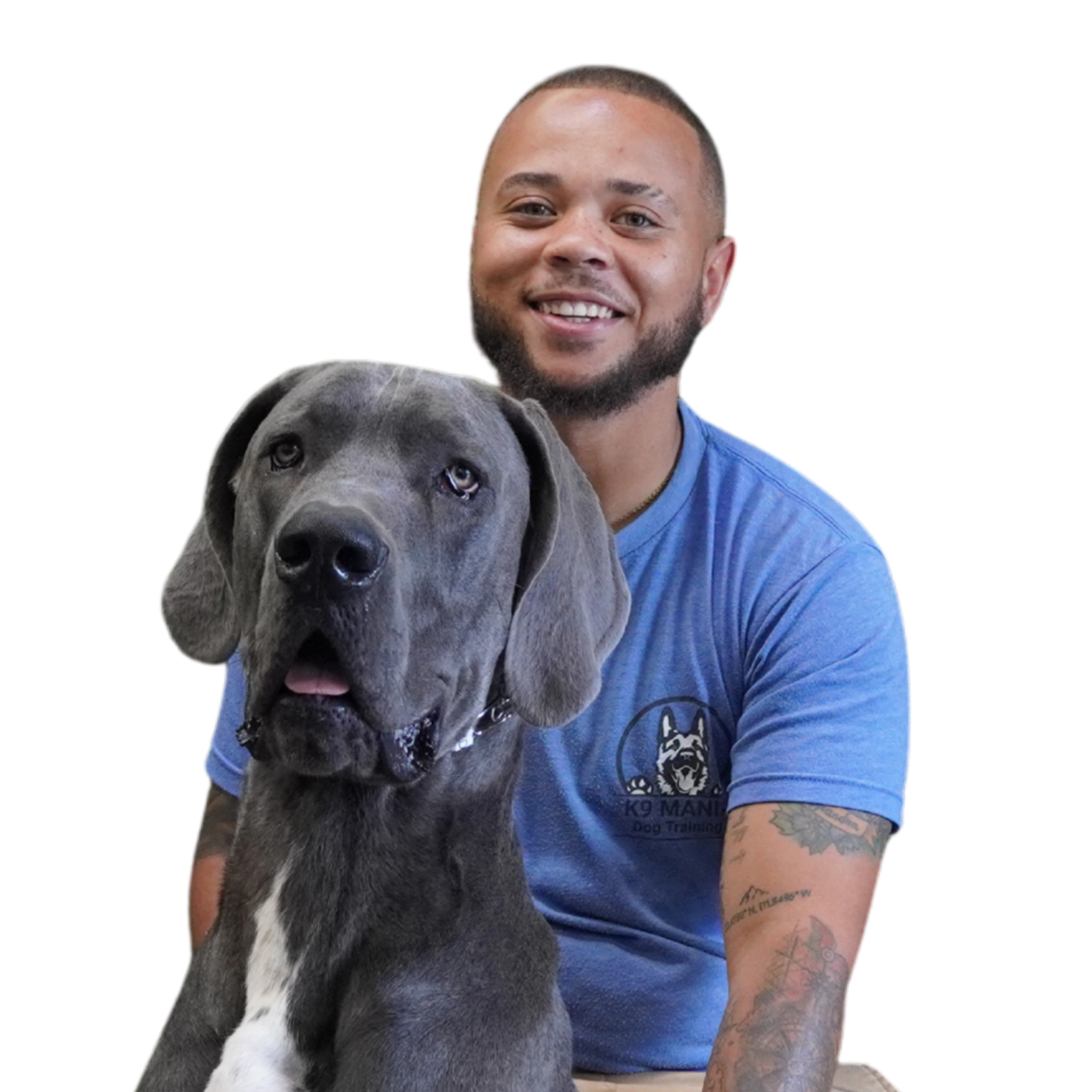 Our Certification 5 K9 Mania Dog Training dog trainer holding a dog
