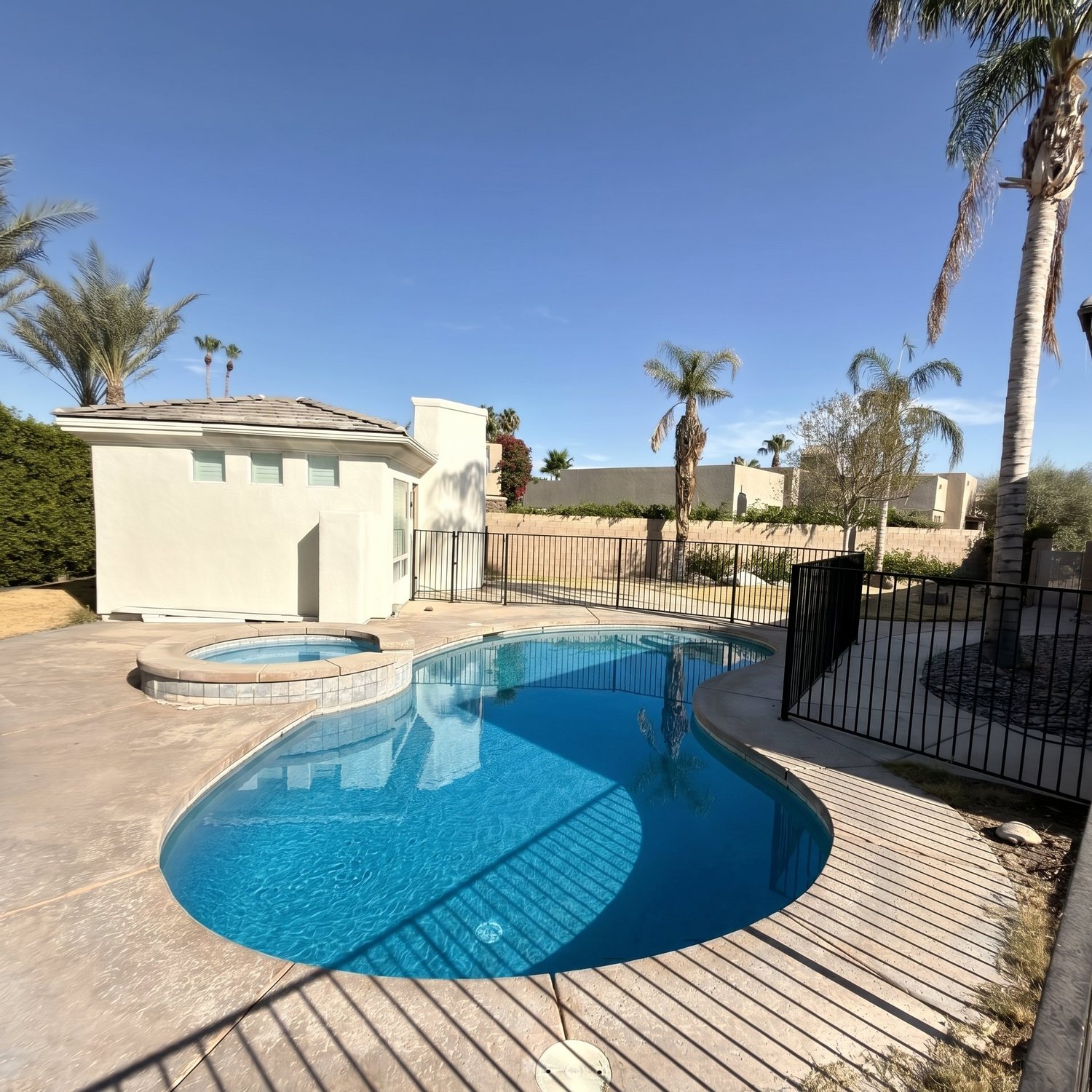 The backyard pool and spa at the Cathedral City home
