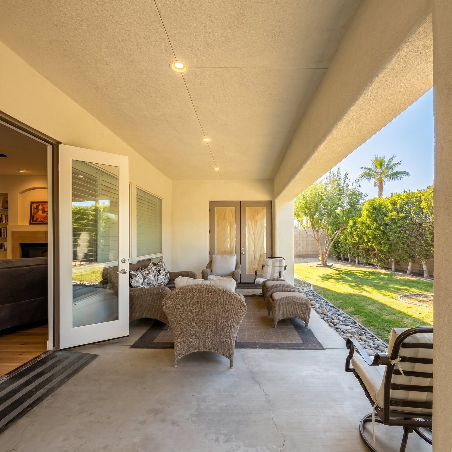 The covered patio looking out to the garden at the Angel's Haven Care home in Cathedral City, California