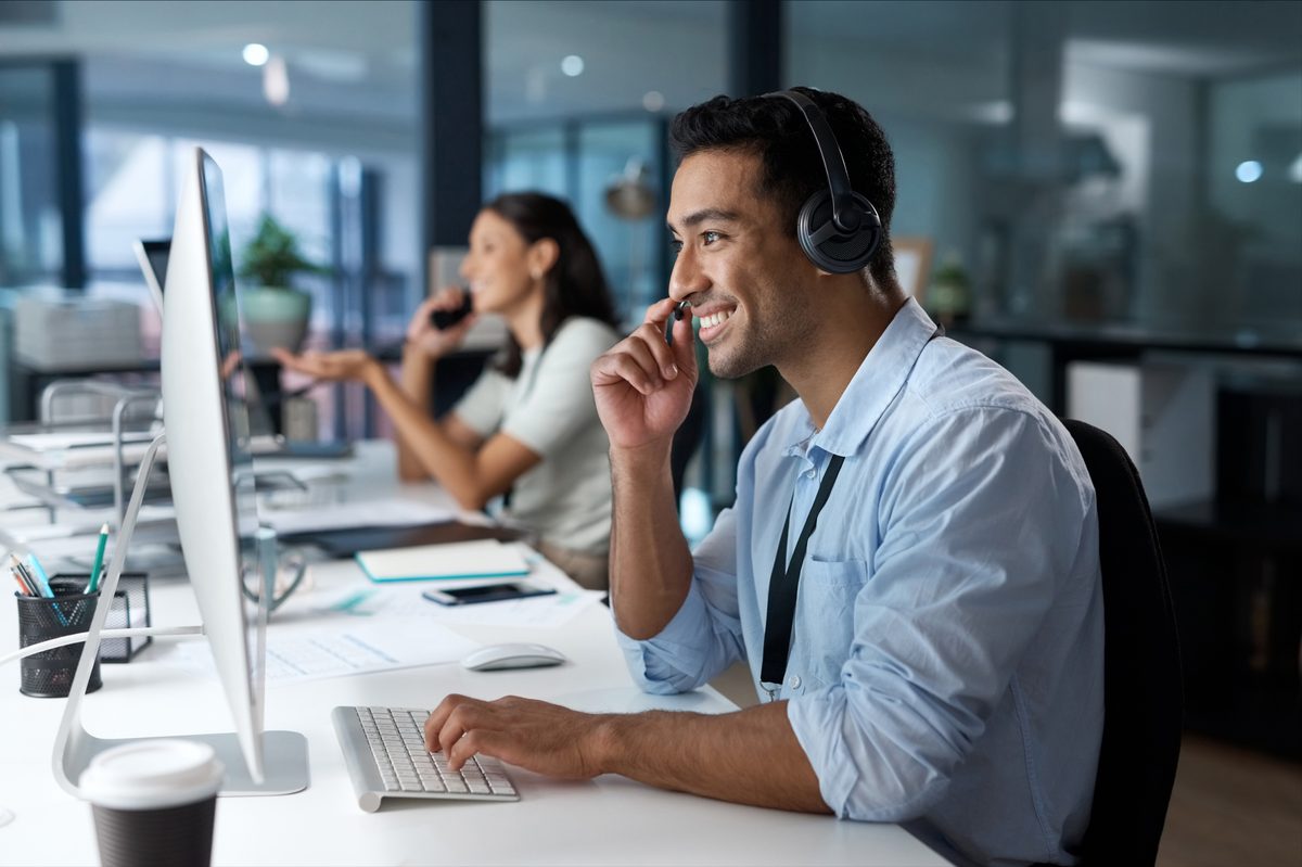 A team taking calls in an office