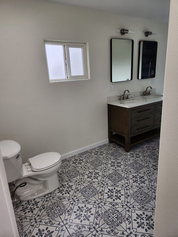 Bathroom with patterned tile floor