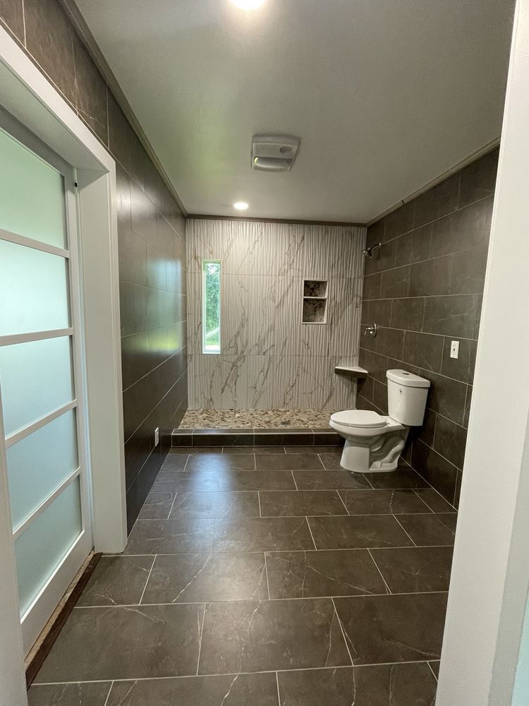 Dark tile walk-in shower