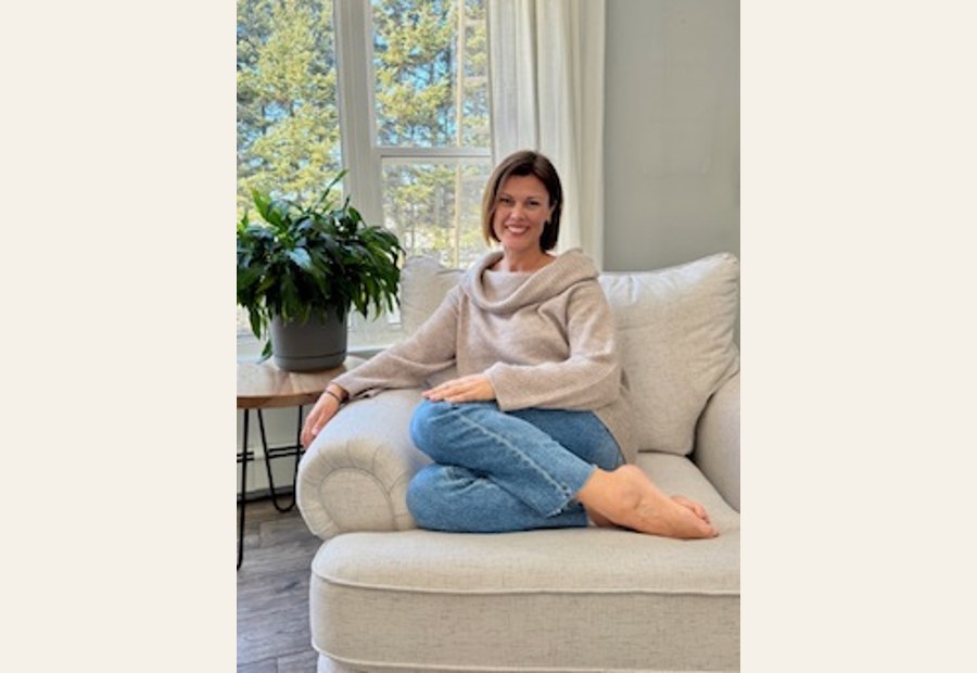 Sarah Carpenter relaxed at home, softly lit