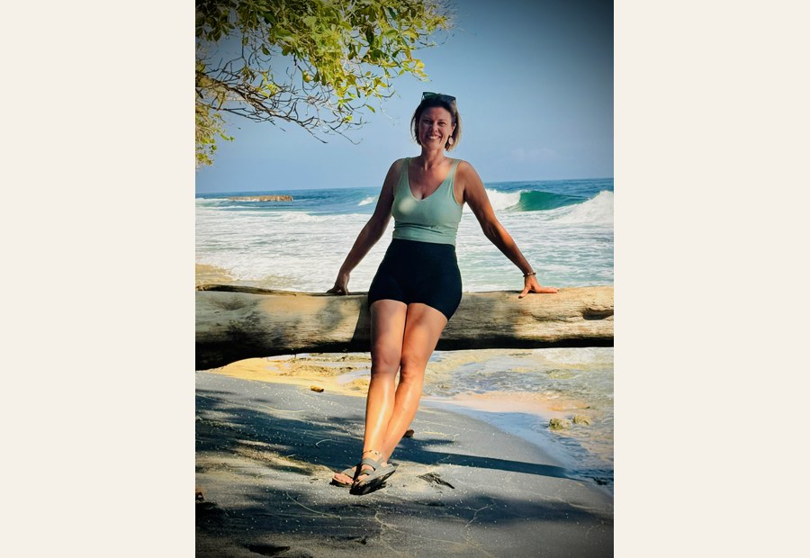Sarah Carpenter walking along the beach