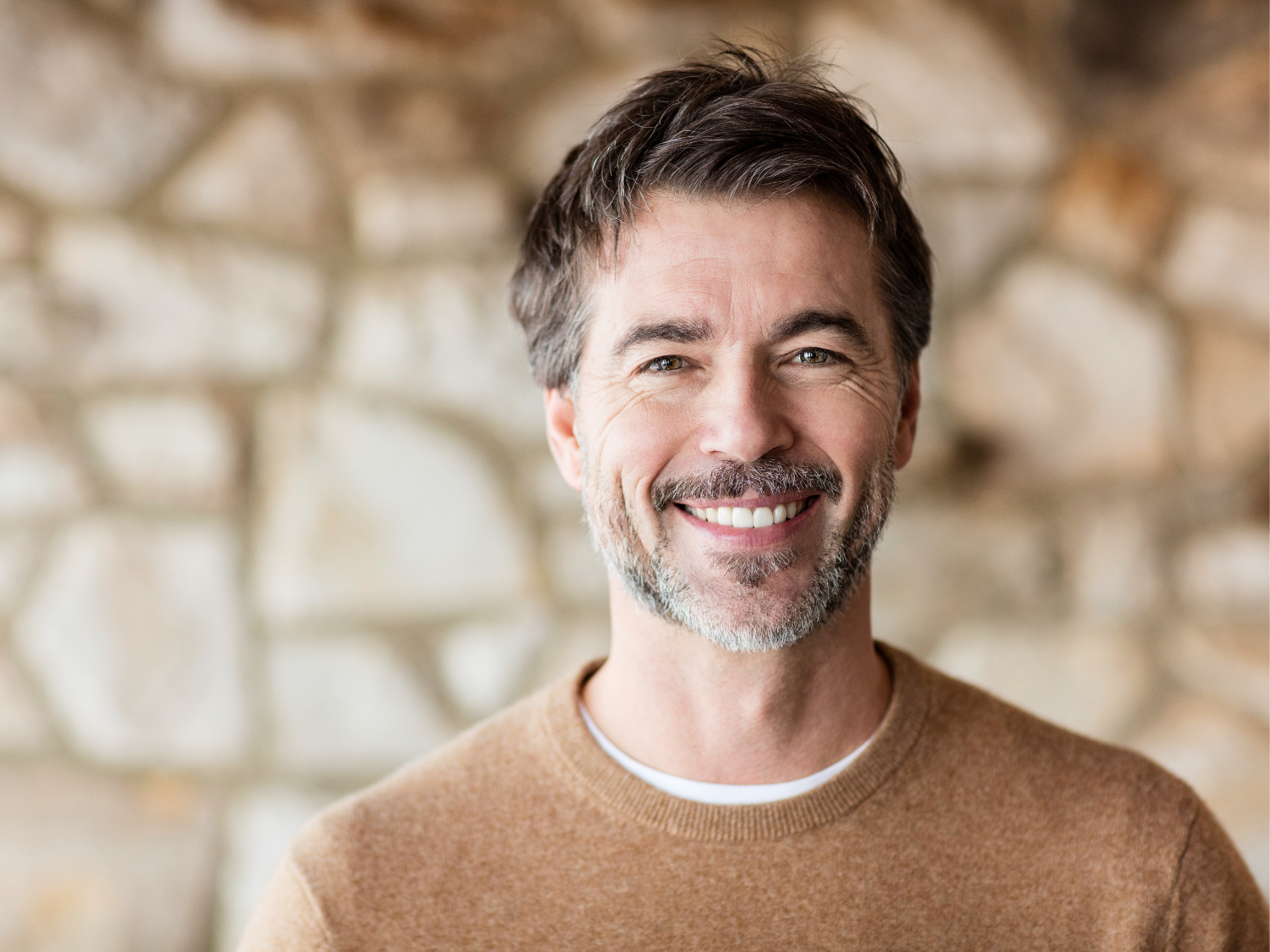 Patient with a confident, transformed smile