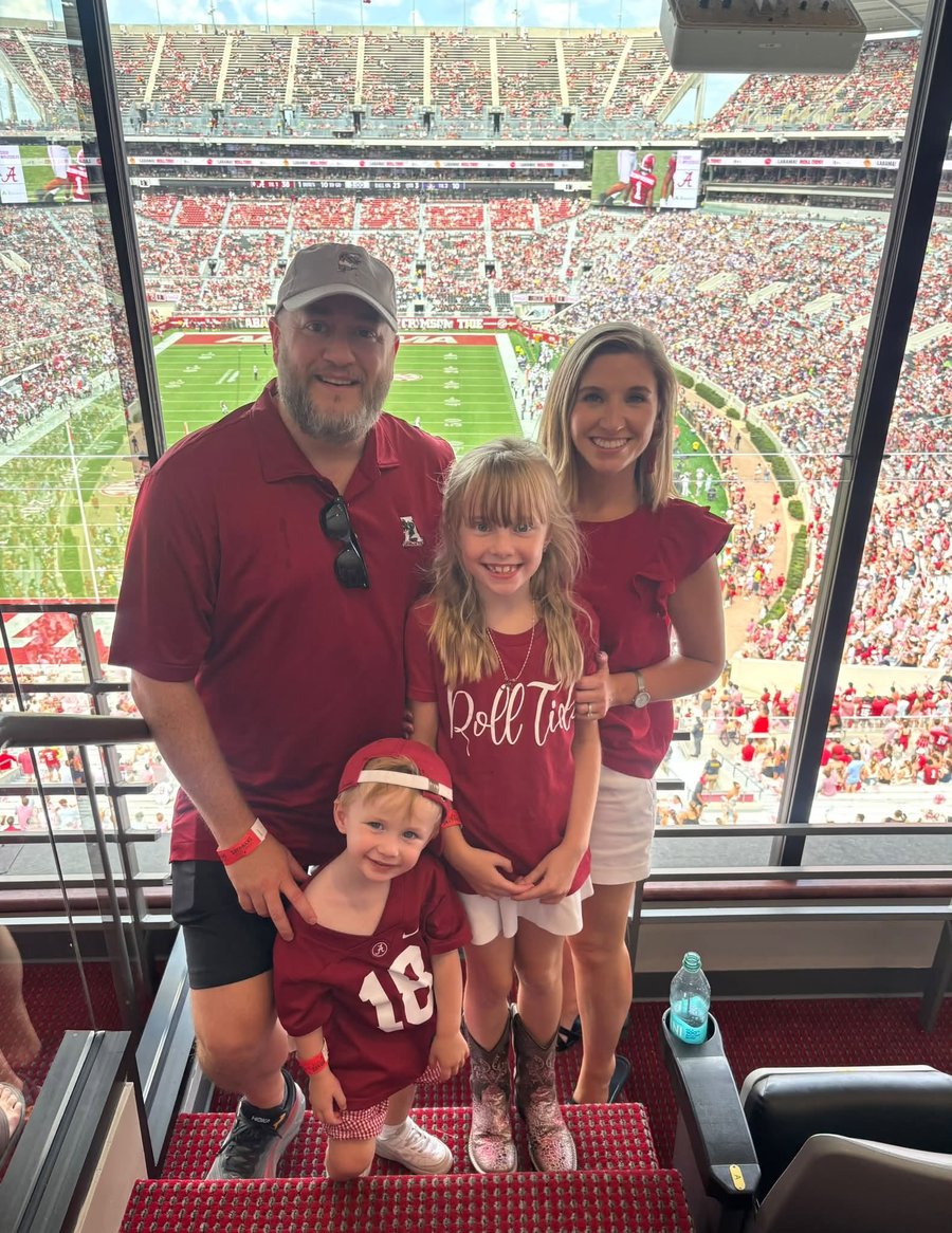The Harris family: Brad, his wife, and their two daughters