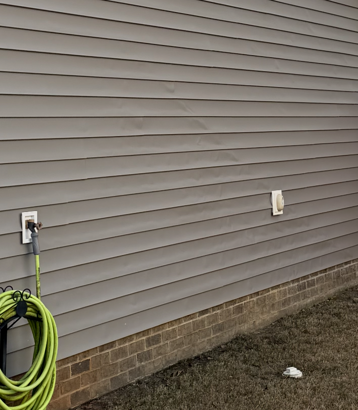 Vinyl siding repair on a home in Raleigh NC