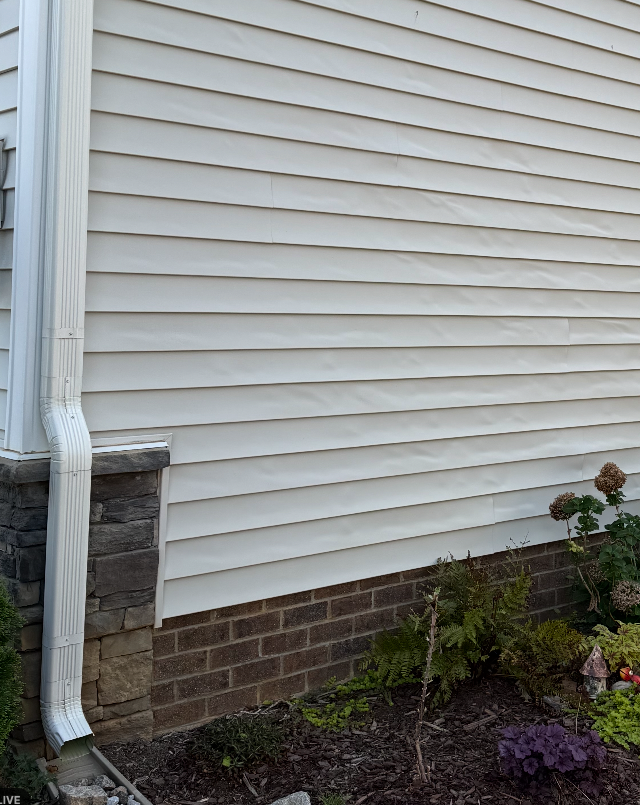 Fresh vinyl siding installed on a home exterior in Raleigh NC