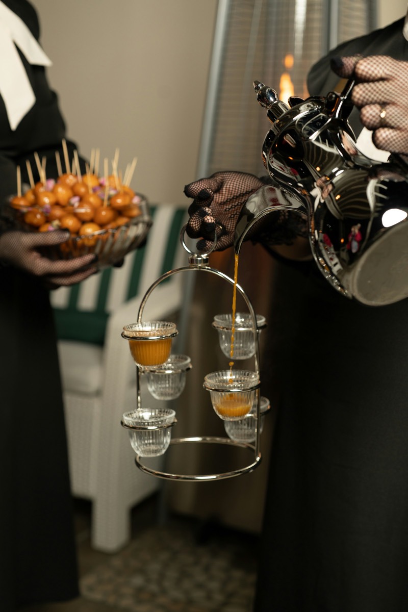 Gahwa poured into small glass cups