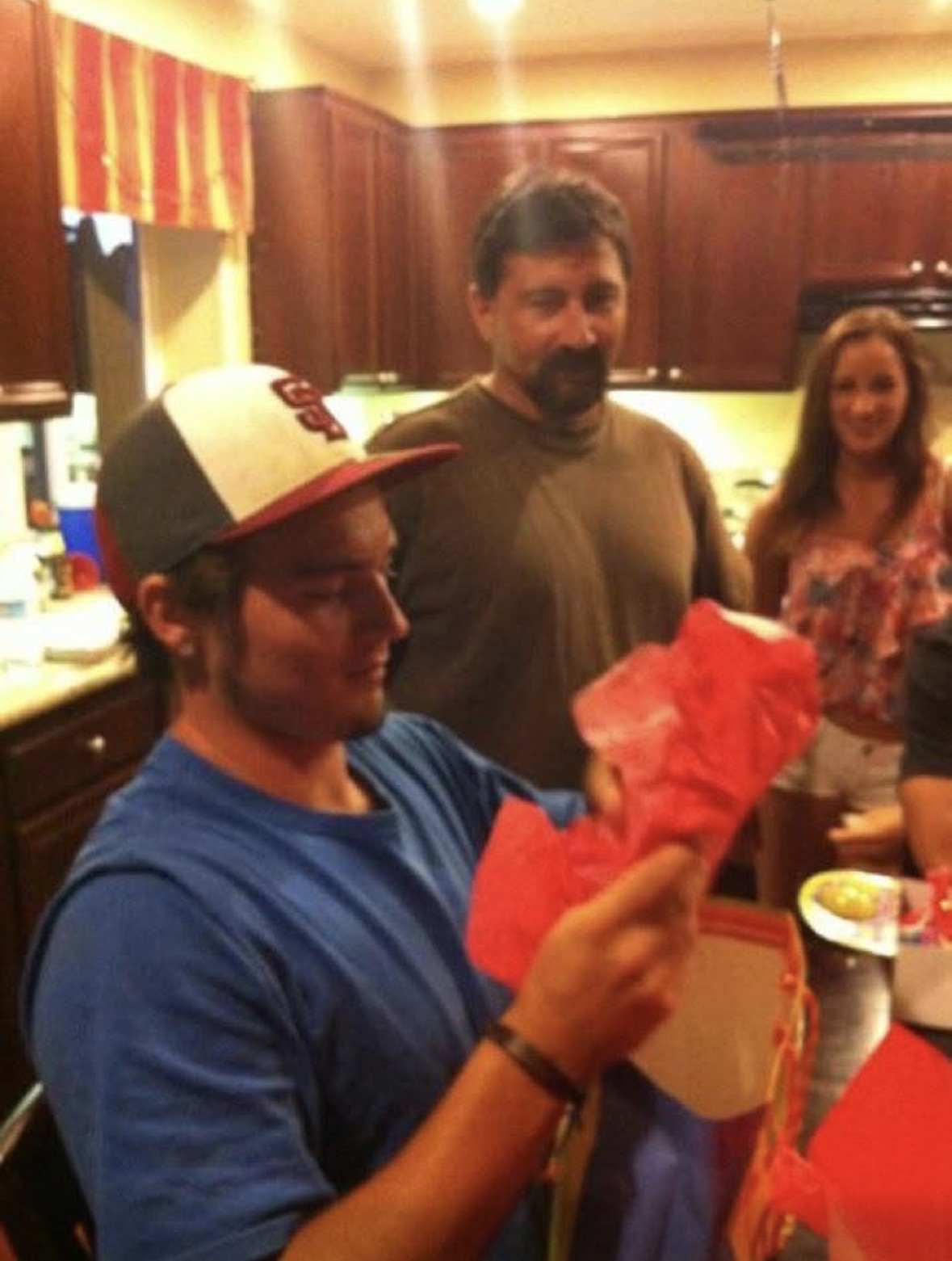 Opening my dad's gift at my 16th birthday
