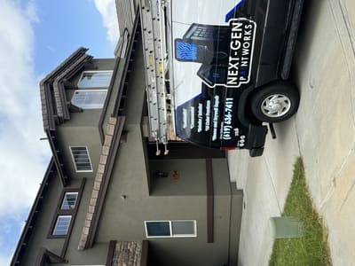 Next-Gen Paintworks branded service van parked in front of a San Diego home