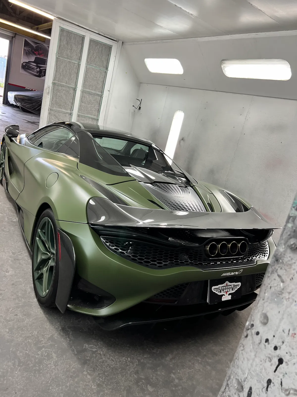 Paintless dent removal technician at Customs by Lopez Compton CA
