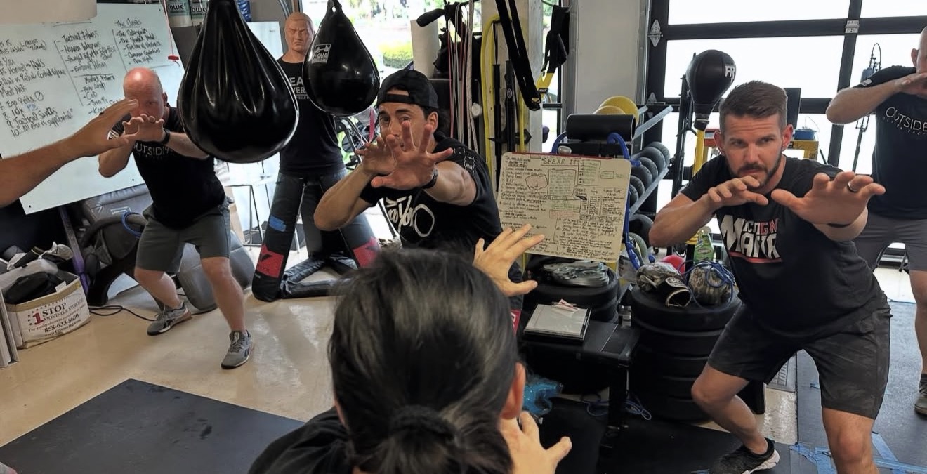 Coach Blauer demonstrating a SPEAR drill in the Tactical Garage Gym