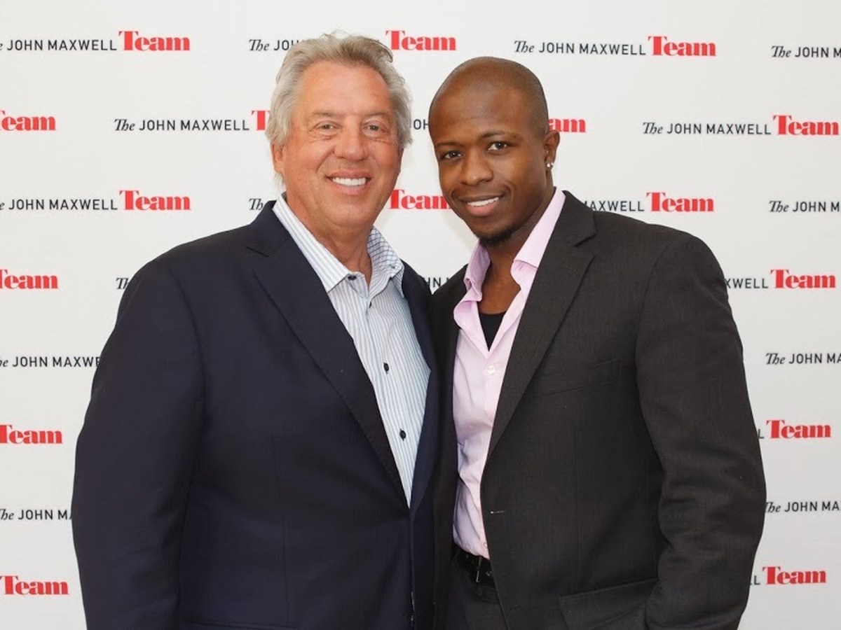 Dr. Karim with John Maxwell