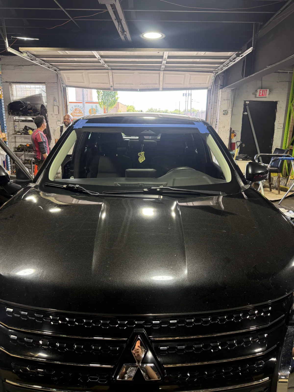 New glass installed on the same Mitsubishi passenger SUV at AMJ