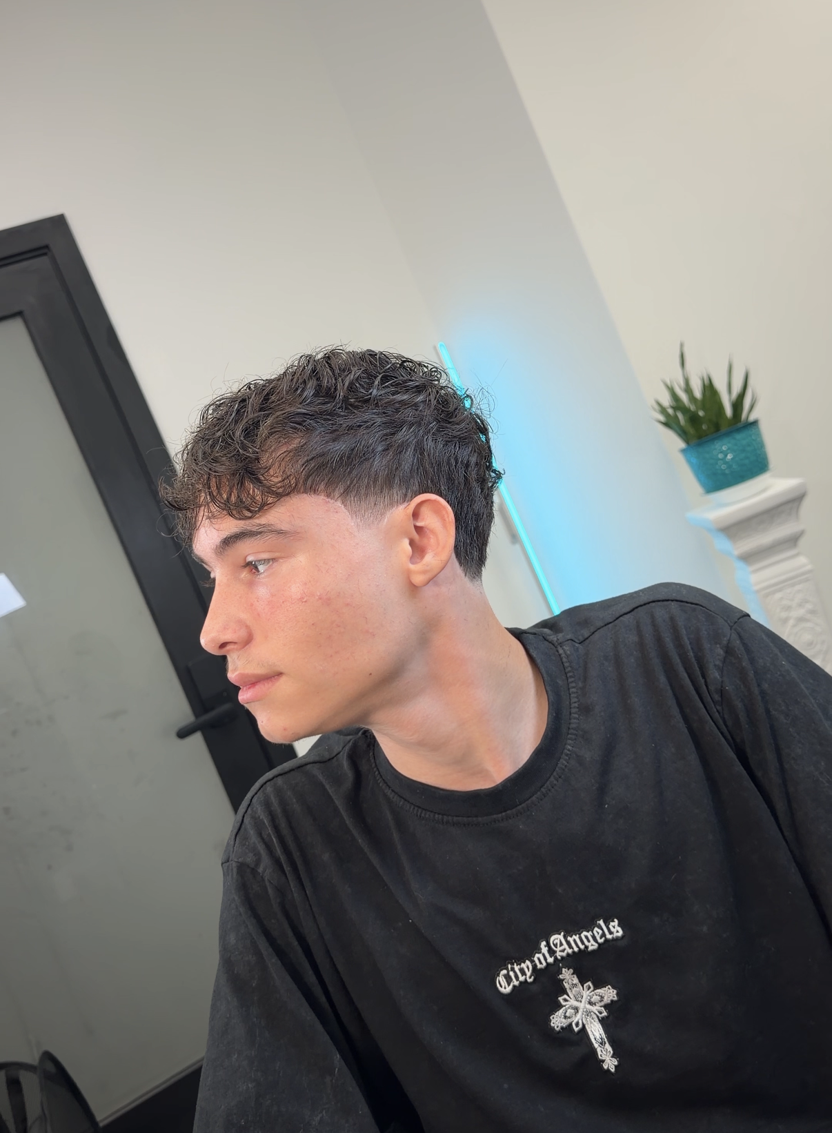 Textured wavy haircut with taper fade Kennesaw GA VIA Domus