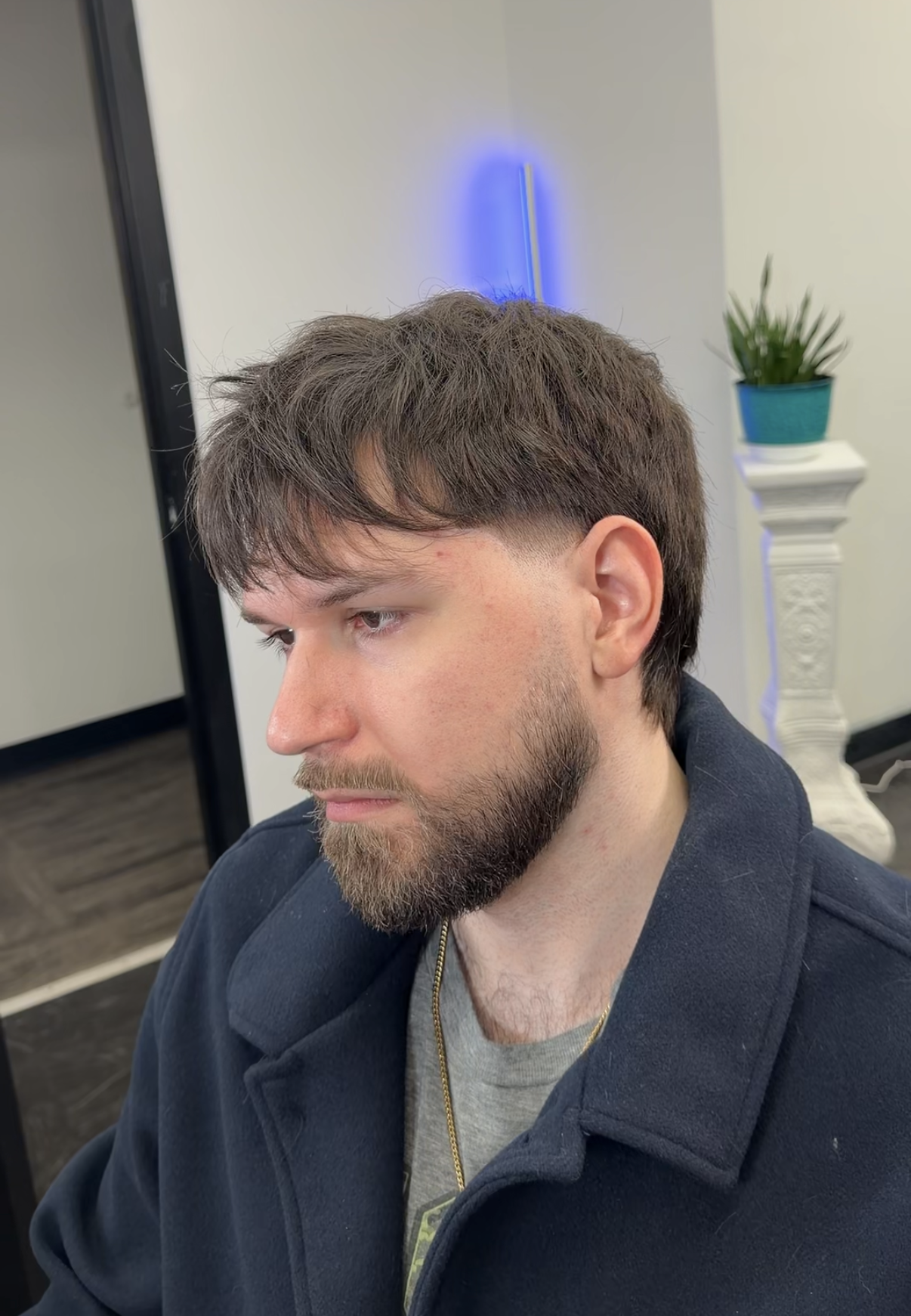 Curly wolf cut back view men's haircut VIA Domus Kennesaw GA