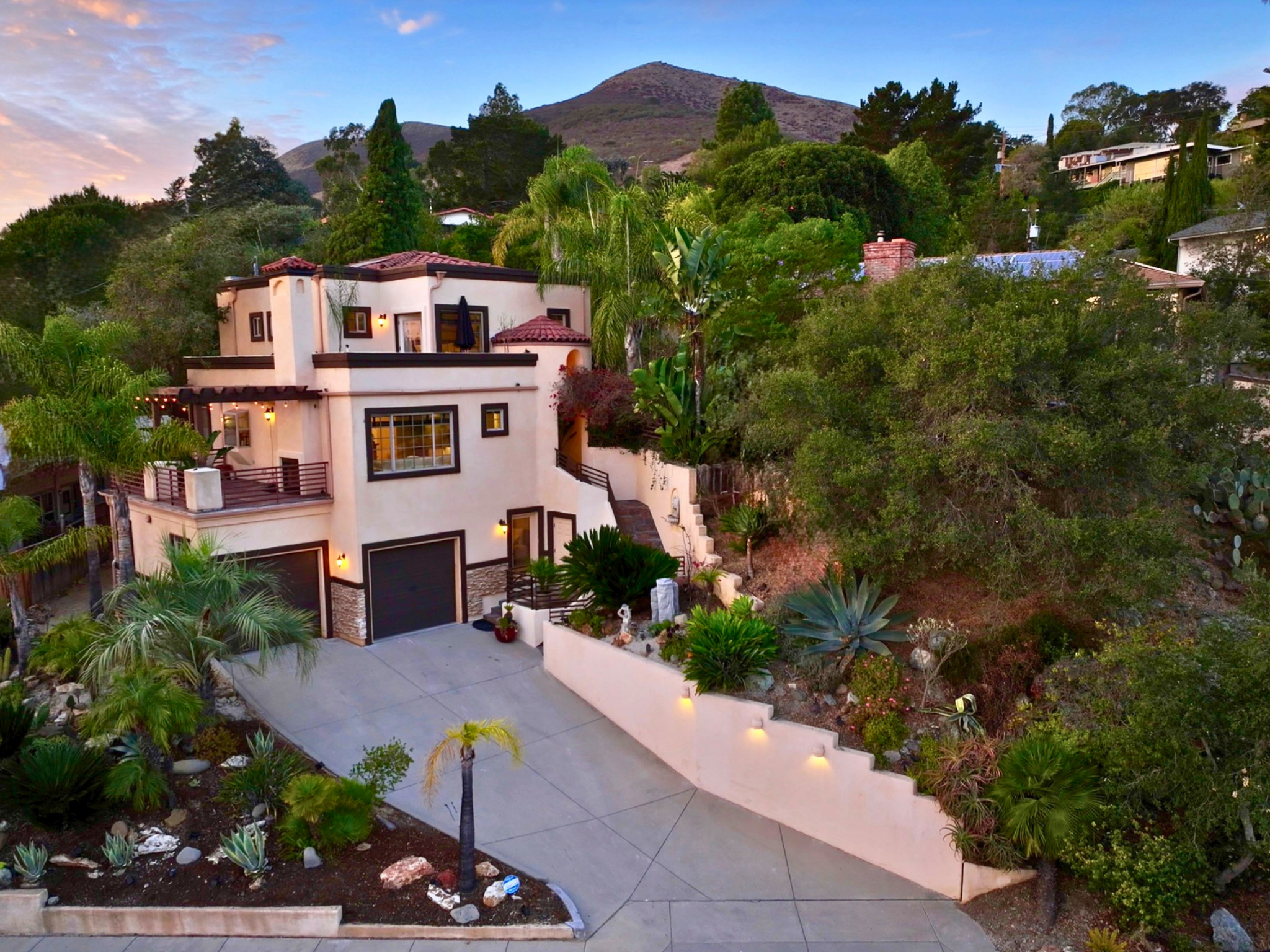 Mediterranean landscaping with slate staircases tracing the natural hillside