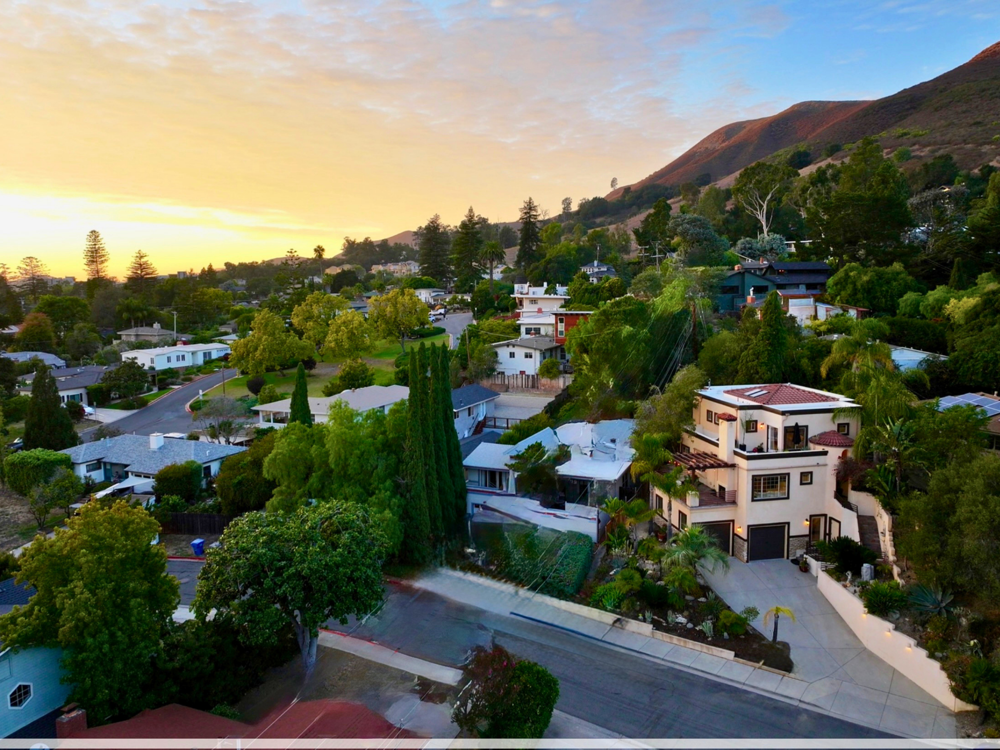 Panoramic sunset view over downtown San Luis Obispo and Bishop Peak