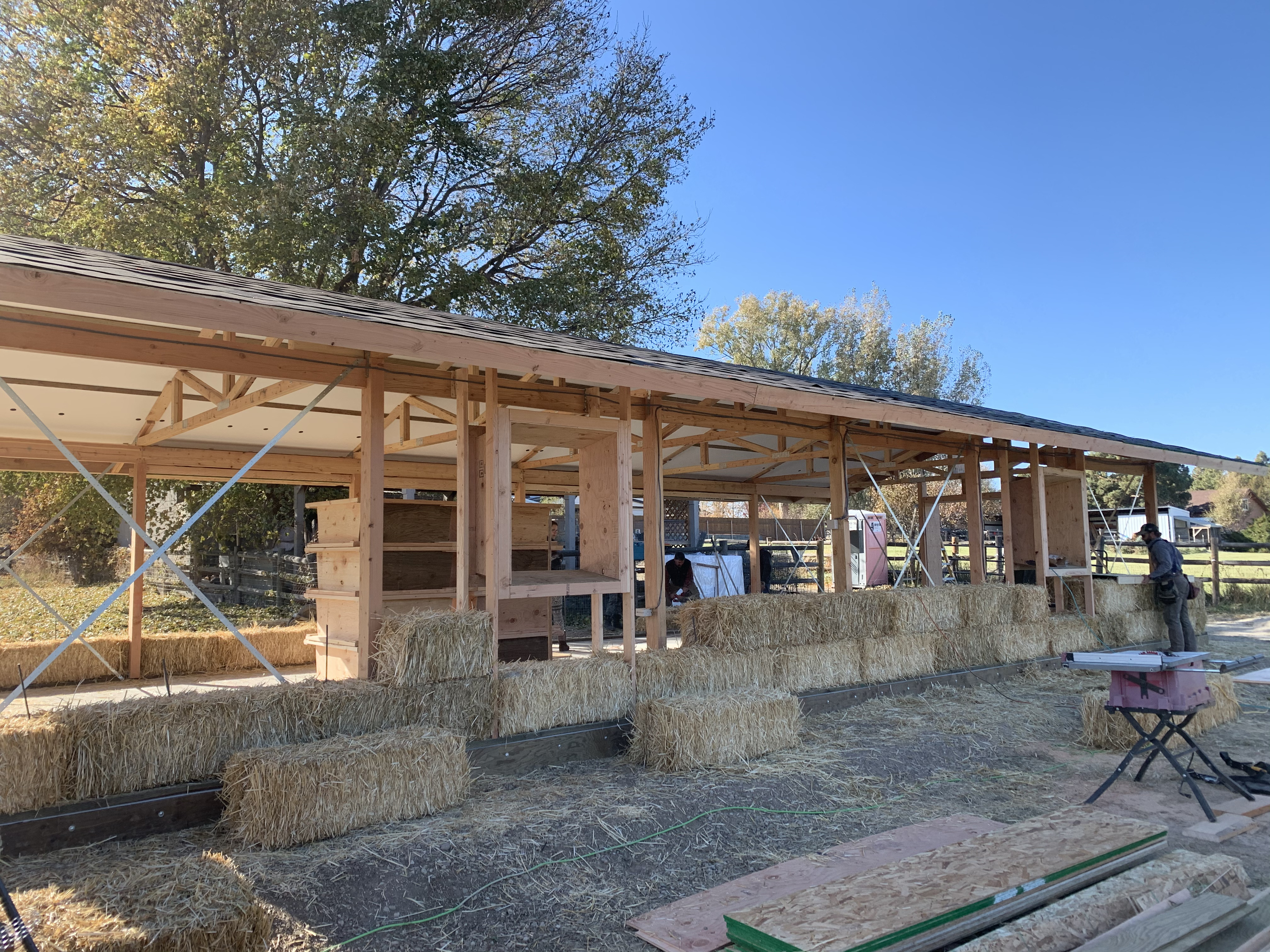 Straw bale wall showing breathable plaster system and moisture management design