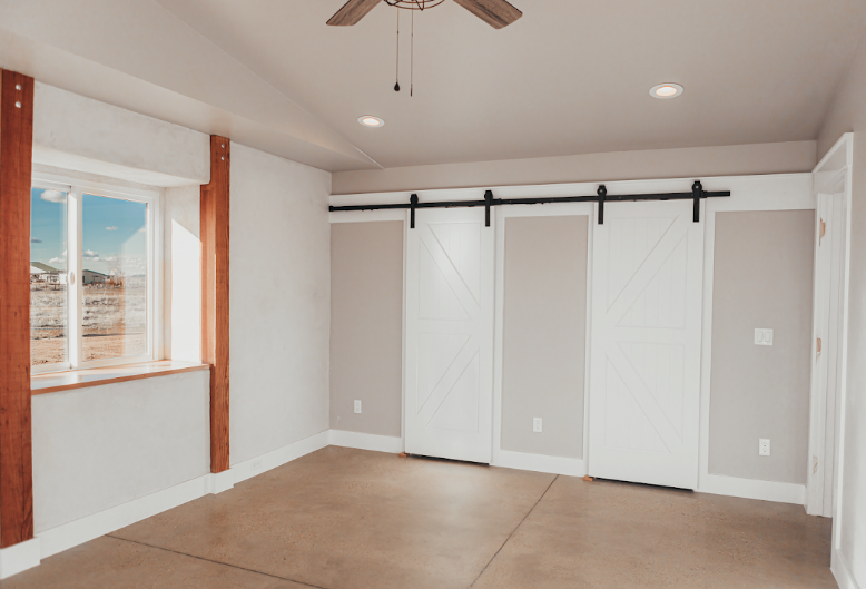 Interior room in straw bale home showing acoustic isolation between spaces in Idaho foothills