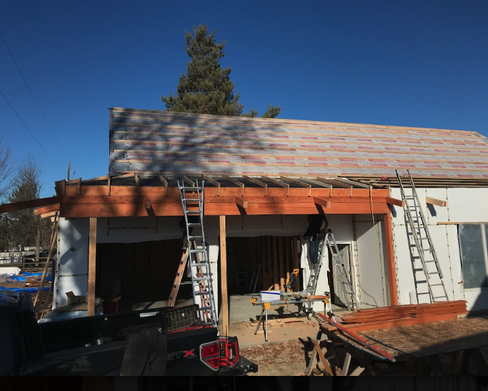 Construction site of high-performance custom home in Boise Valley with passive solar design principles
