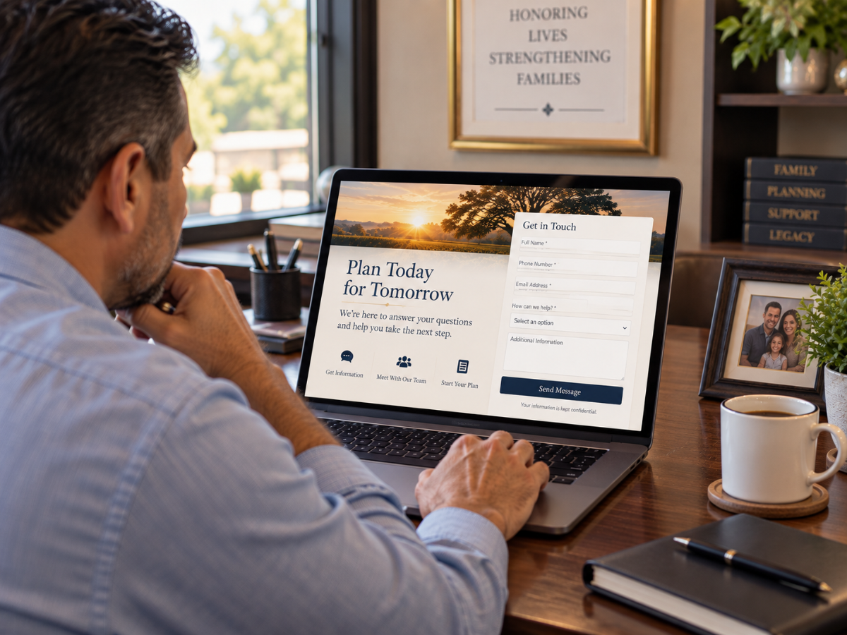Funeral home website contact form on a laptop screen