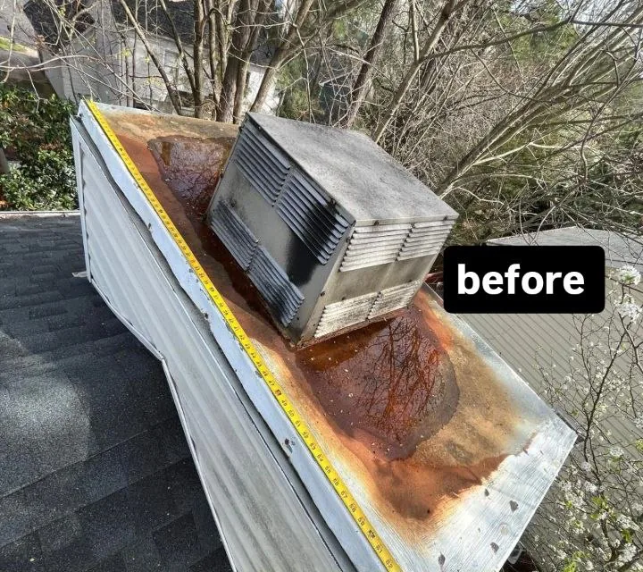 Rusted-through chase cover before replacement