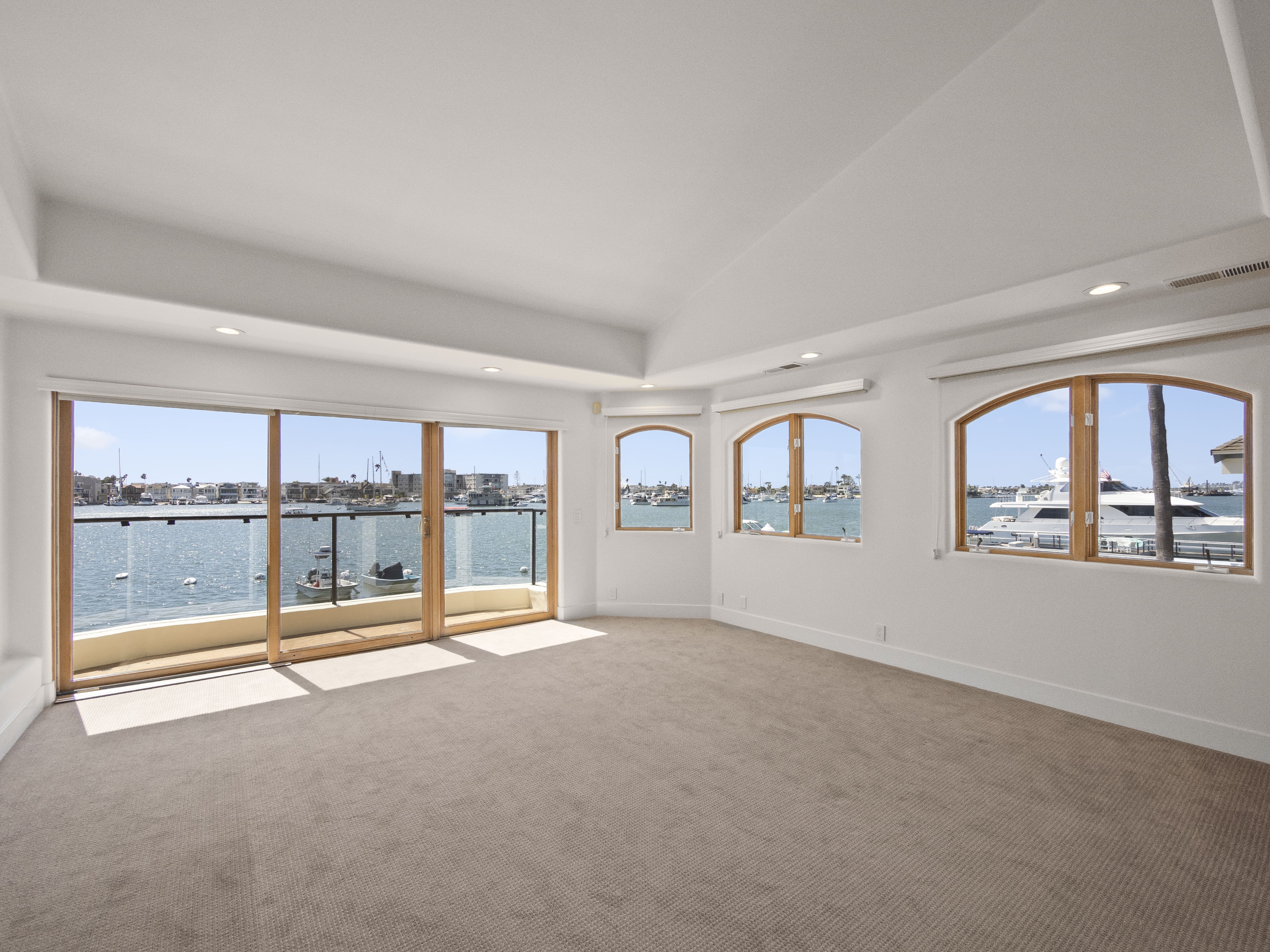 Bay front elevation with private dock and waterfront terrace