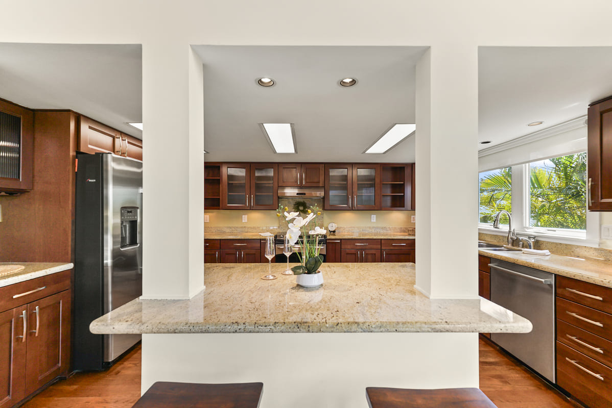 Another dining and living area around the corner from the kitchen