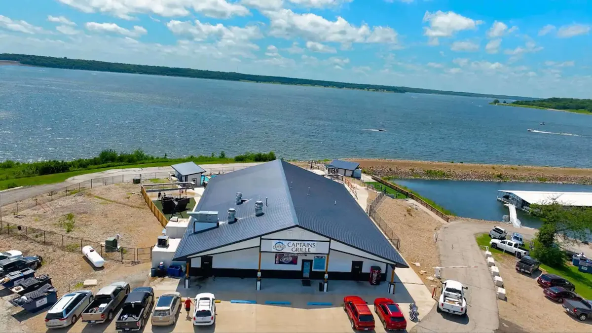 Captain’s Grille building and Perry Lake aerial view