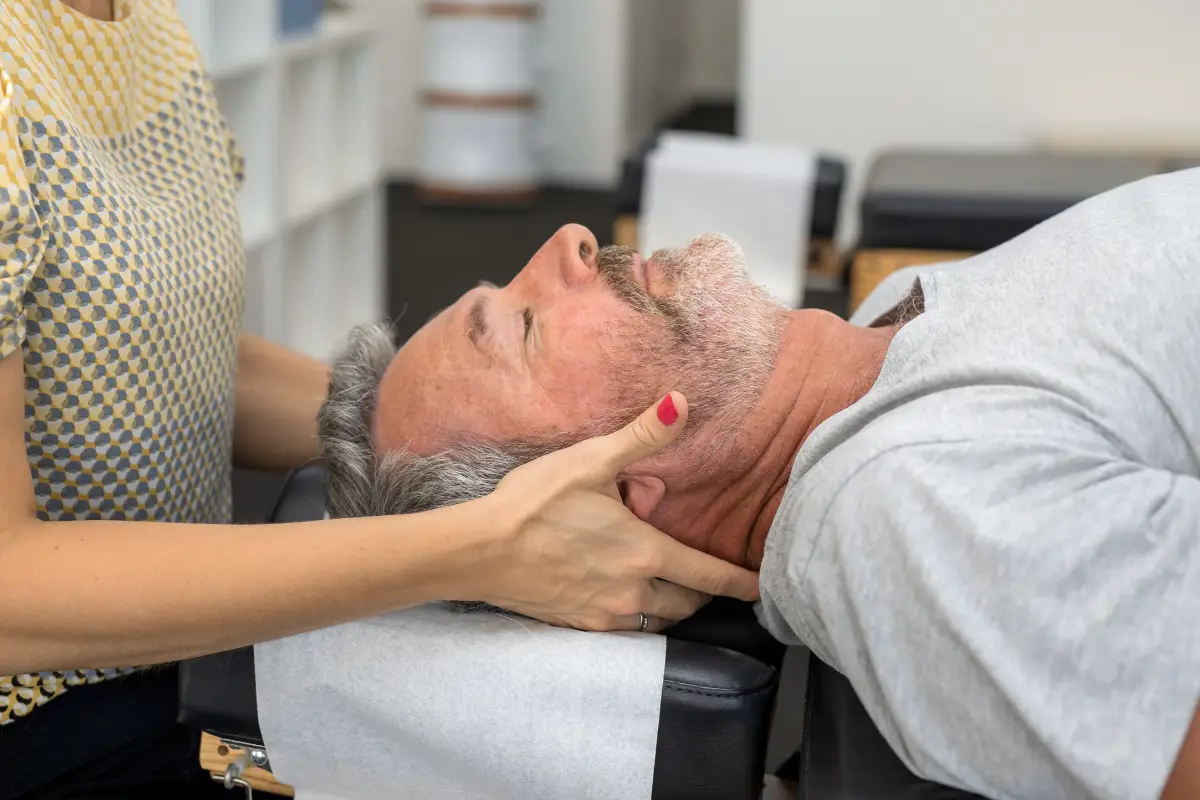 Chiropractic neck adjustment in progress