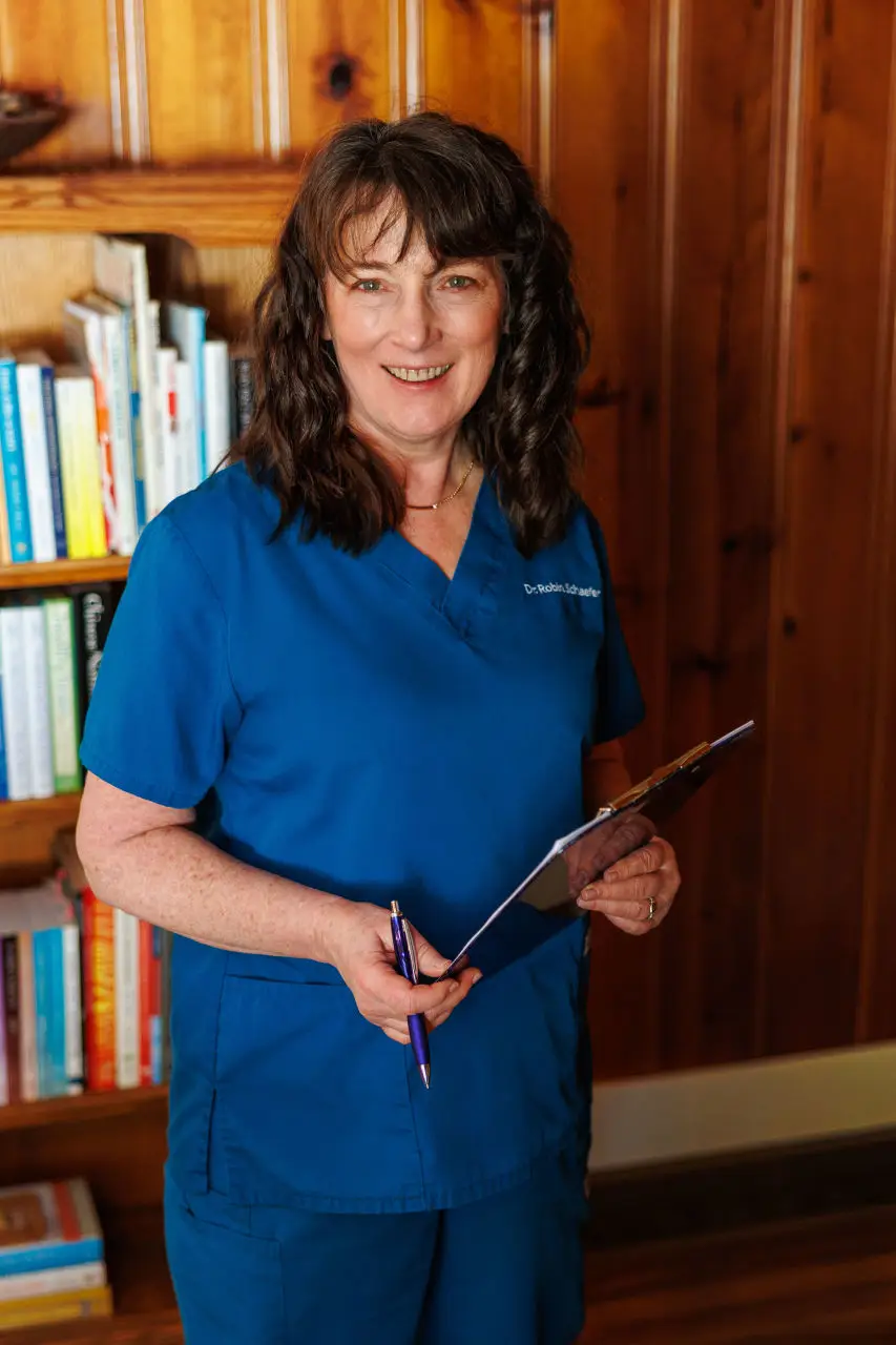 Dr. Robin Schaefer, DC, LAc, in her office