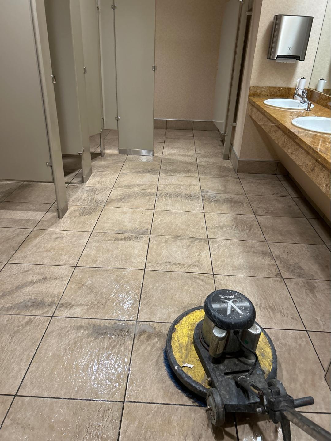 Golden Rule Cleaning deep cleaning commercial tile floors with professional floor scrubber in St. Charles MO
