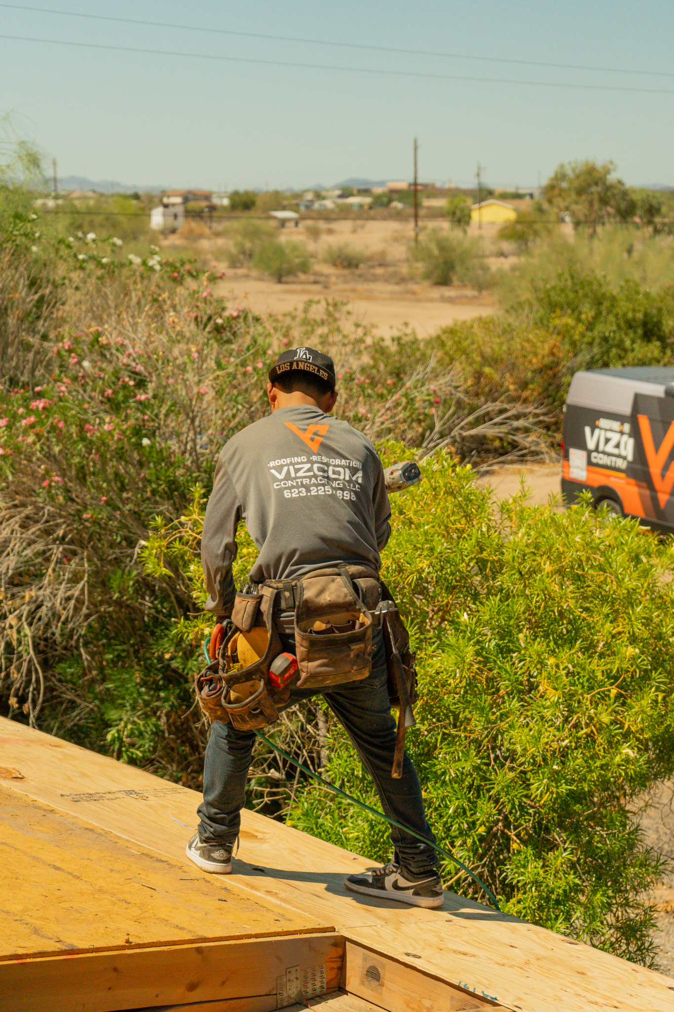 Vizcom team member nailing down board