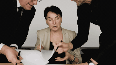 Founder under pressure as colleagues challenge her with paperwork from both sides