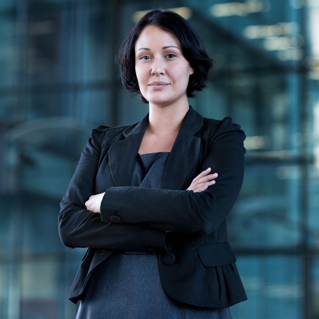 A startup founder working with her team